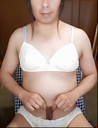 She is wearing a bra and panties and looks rather provocative.